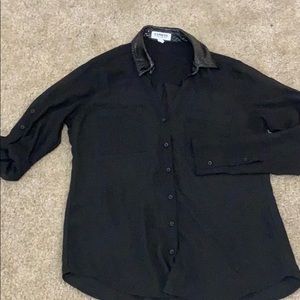 Sheer button up shirt with patent leather collar.